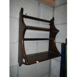 A small Ercol shelf unit, 42 x 28 x 21 cm.