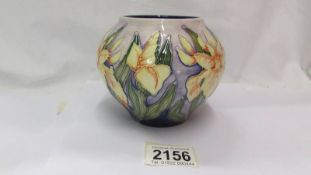 A Moorcroft small bulbous floral design vase (second).