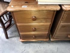 A solid pine 3 drawer bedside chest, 46 x 39 x 61 cm tall.