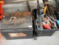 A tin box of tools and one other.