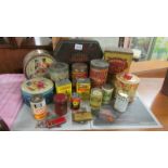 A mixed lot of old tins etc., including Macintosh, Bournville, Slippery Elm etc.