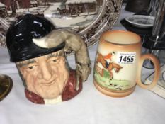 A Royal Doulton D6531 Gone Away character jug & a Carlton ware John Peel tankard (non musical)