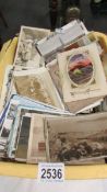 A large collection of old postcards.