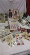 In excess of 200 interesting old postcards and greeting cards.