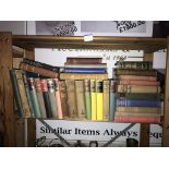 A selection of vintage hardback books including Hemmingway