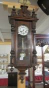 A Victorian mahogany wall clock.