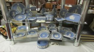 In excess of 25 pieces of Wedgwood Blue Jasper ware.