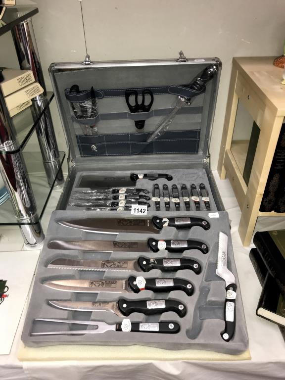 A cased set of Offenbach Solingen chefs knives set in aluminium lockable case,