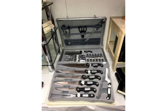 A cased set of Offenbach chefs set in aluminium lockable case, 1 knife missing