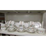 A 20 piece Paragon "Anastasia" pattern tea set.