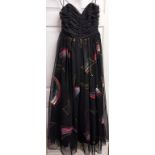 John Charles black printed chiffon evening gown with ruched bodice detailing and full printed skirt