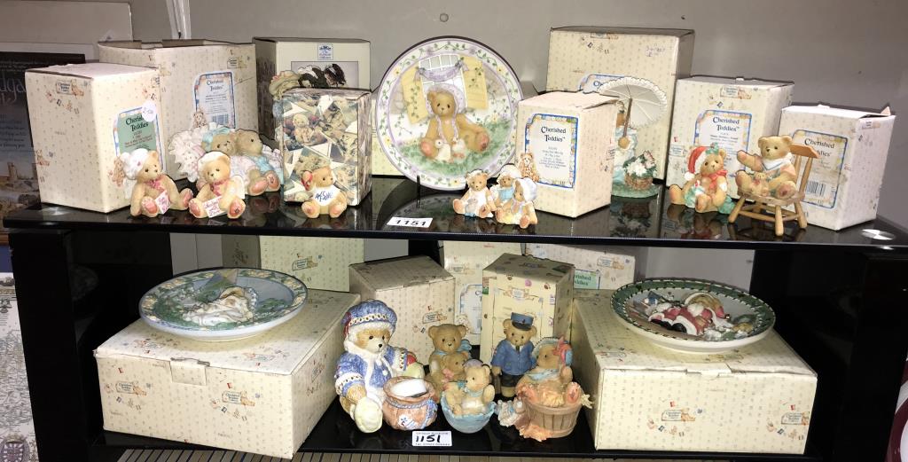 A quantity of boxed cherished teddies etc