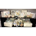 A quantity of boxed cherished teddies etc