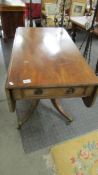 A mahogany Pembroke table.