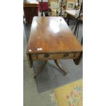 A mahogany Pembroke table.