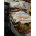 A large lot of bedding, quilts etc.