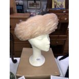 A vintage feather hat with box (missing lid) head not included