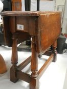 A small drop leaf table.