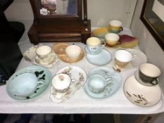 A quantity of vintage sandwich plates with cups