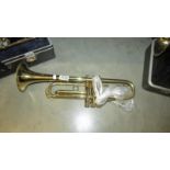 An OIK "Amati Kraslice" trumpet with mouthpiece.
