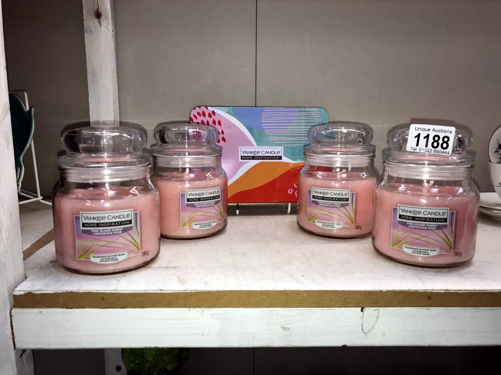 4 new Yankee candles (medium size)'Pink Island sunset & box of tea lights