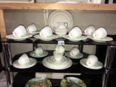 A deco style 40 piece Wedgwood tea set includes 2 sandwich plates,