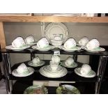 A deco style 40 piece Wedgwood tea set includes 2 sandwich plates,