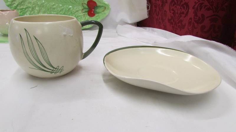 A Carlton ware cup and saucer and two other pieces of Carlton ware. - Image 2 of 4