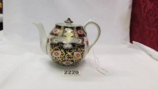 An early Macintyre Imari pattern teapot in good condition.