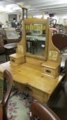 A pine dressing table with Pear's signage to mirror.