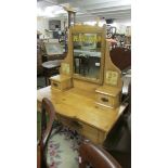 A pine dressing table with Pear's signage to mirror.