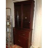 A mahogany effect bookcase.