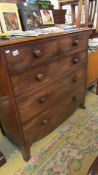 A two over three mahogany chest of drawers.