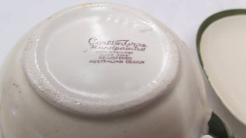 A Carlton ware cup and saucer and two other pieces of Carlton ware. - Image 3 of 4
