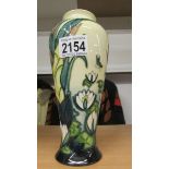A Moorcroft 8" Lamia vase, silver line.