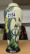 A Moorcroft 8" Lamia vase, silver line.