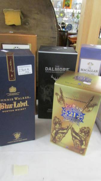 Five boxed bottles of Scotch whisky - Macallan 25 yr, Macallan 18 yr, Johnnie Walker Blue Label,