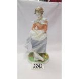 A limited edition Royal Worcester figure - Old Country ways 'A Farmer's Wife', 675/9500.