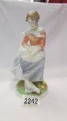 A limited edition Royal Worcester figure - Old Country ways 'A Farmer's Wife', 675/9500.