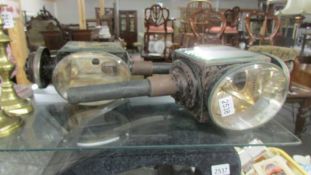 A good pair of Victorian carriage lamps with bevelled glass makred Clulow & Orian, Leicester.