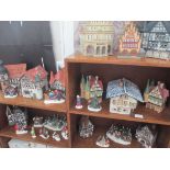 A nice collection of German porcelain Christmas houses & figures (many boxed)
