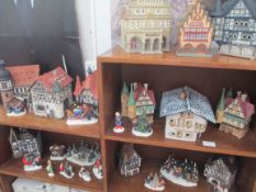 A nice collection of German porcelain Christmas houses & figures (many boxed)