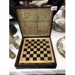 An oriental lacquered box containing a chess set ****Condition report**** The
