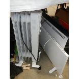Three good clean electric heaters.