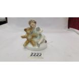 A Royal Doulton figurine 'My Teddy', HN2177.