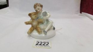 A Royal Doulton figurine 'My Teddy', HN2177.