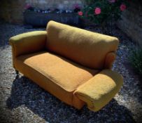 A 19th century? Victorian 2 seater drop arm sofa in ochre fabric.