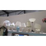 Seven assorted table lamps.