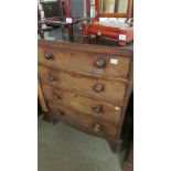 A four drawer mahogany chest.