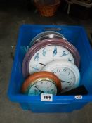 A box of wall clocks.